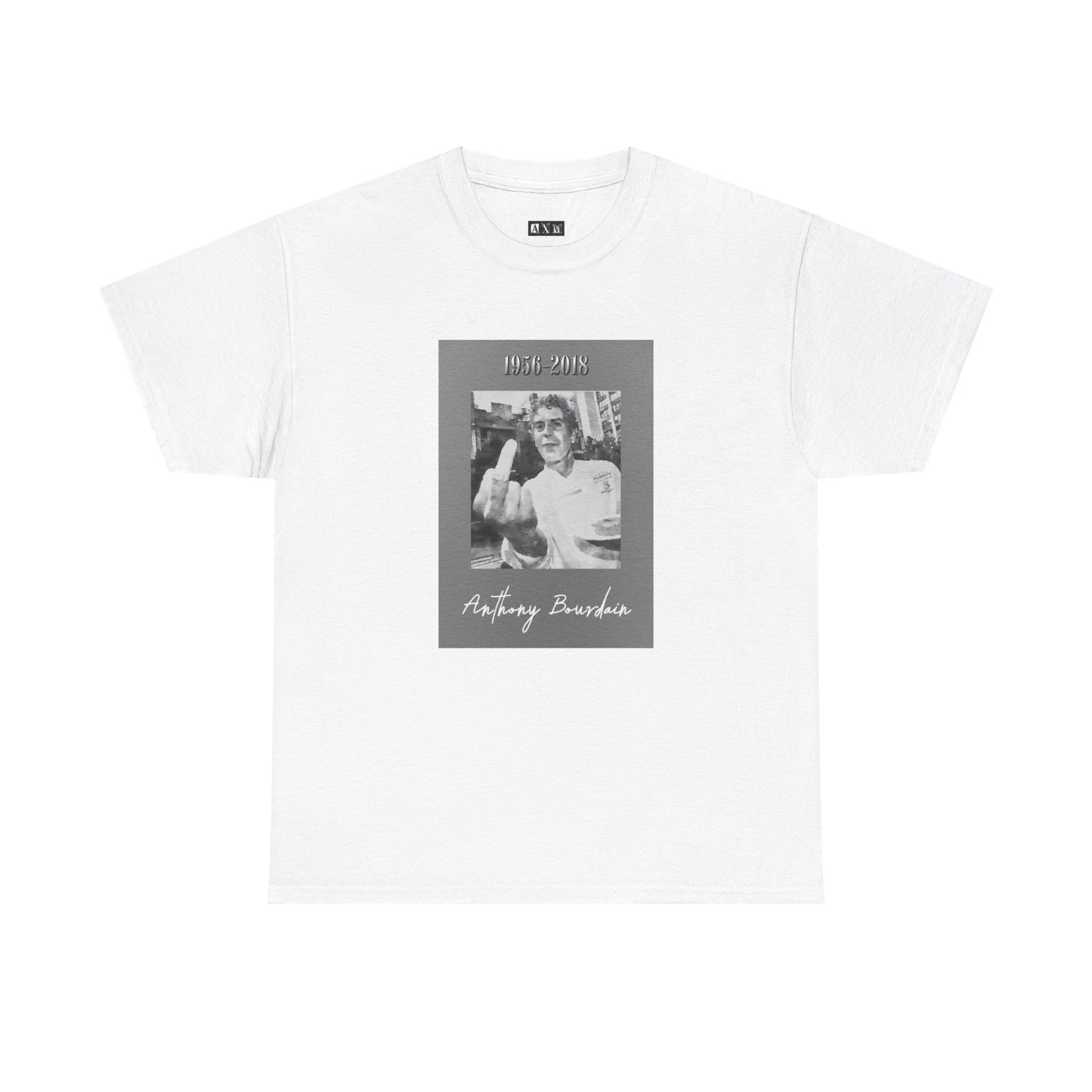 Anthony Bourdain unisex heavyweight tee shirt featuring his years 1956-2018. A stylish tribute to the late chef and TV personality. Perfect for fans of his extraordinary life and unapologetic spirit.