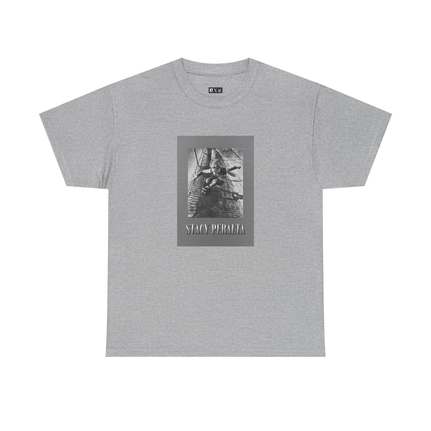 Stacy Peralta unisex heavyweight tee shirt. It unleashes skateboarding’s raw spirit with a gray border and vintage photo. A tribute to rebellion, freedom, and fearless style. Wear history. Command attention.