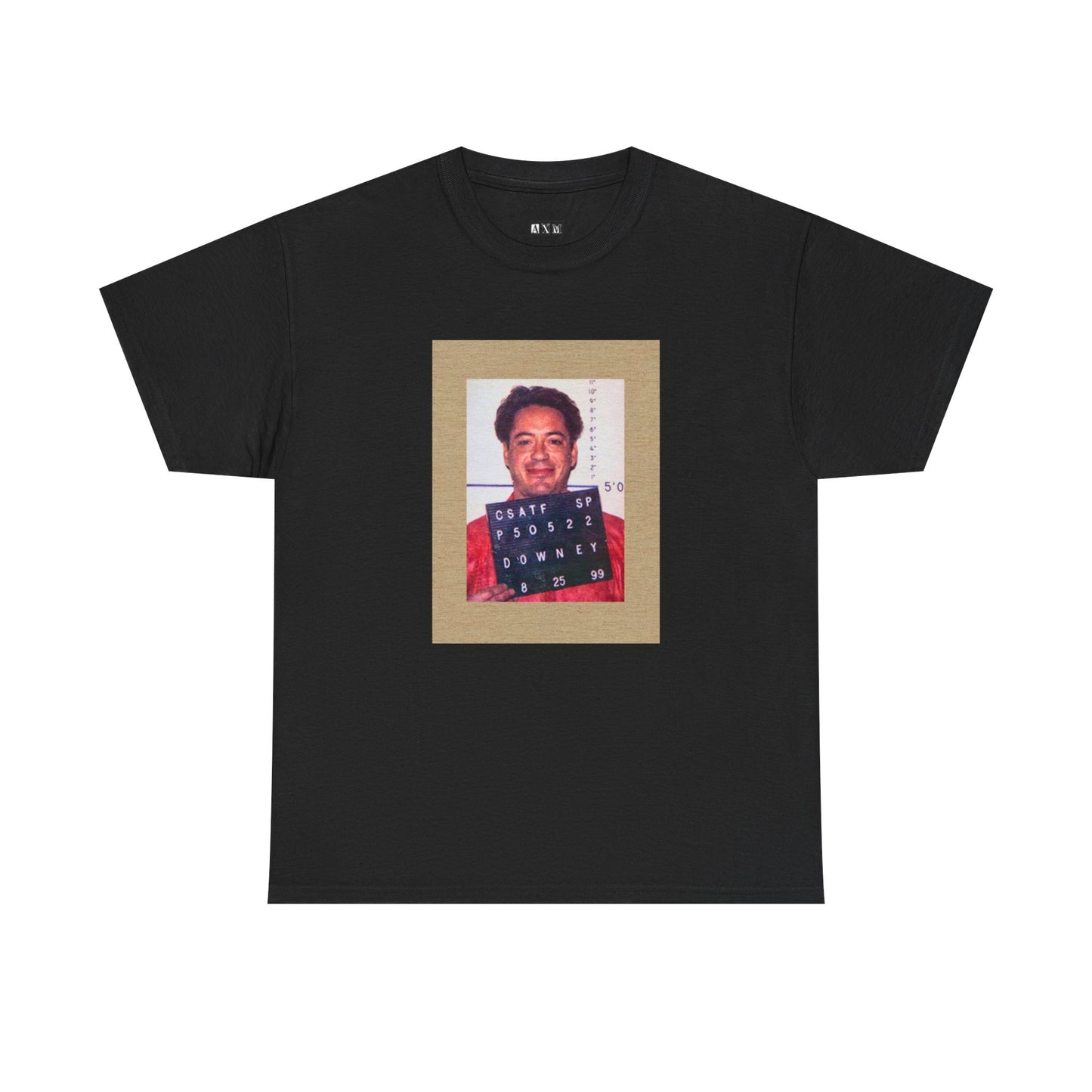 Robert Downey Jr. unisex heavyweight tee shirt featuring his infamous mugshot, a raw symbol of downfall and comeback. Wear it as a statement of grit, chaos, and ultimate redemption.